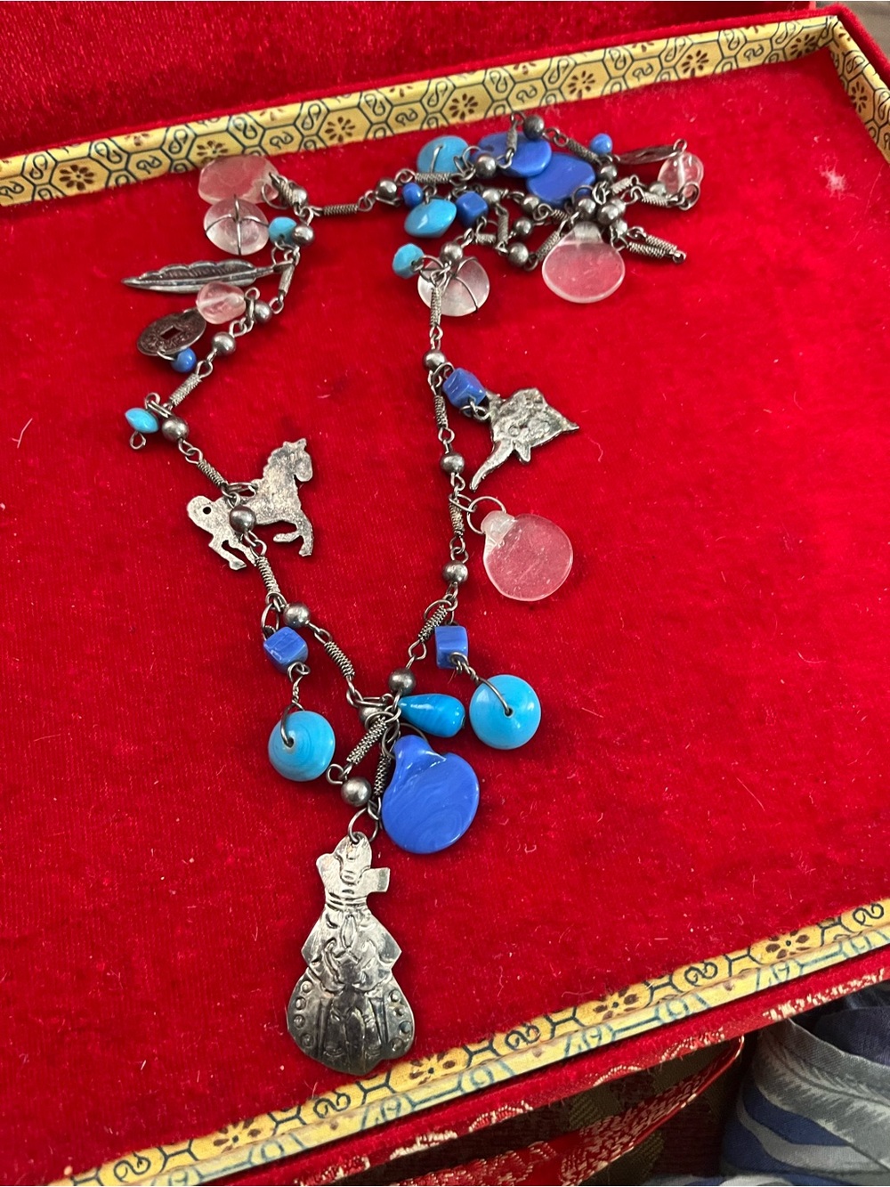 Handcrafted Blue Charm Necklace with Silver Pendants